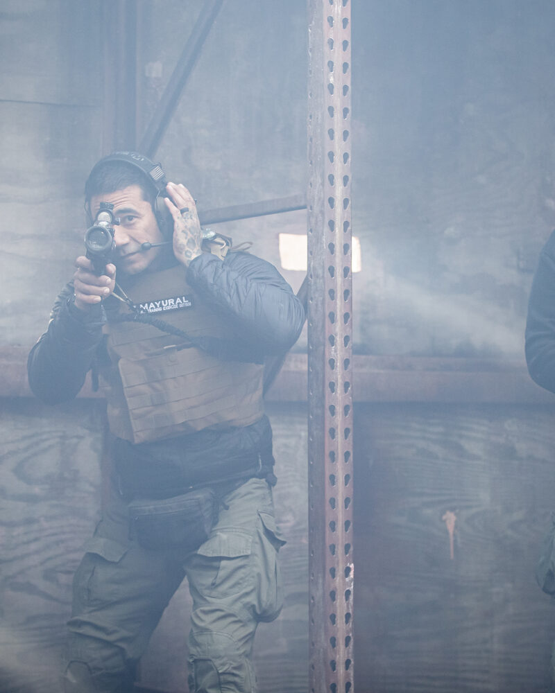 Tactical operators in body armor moving through smoke, military and tactical photography by Mind Shift
