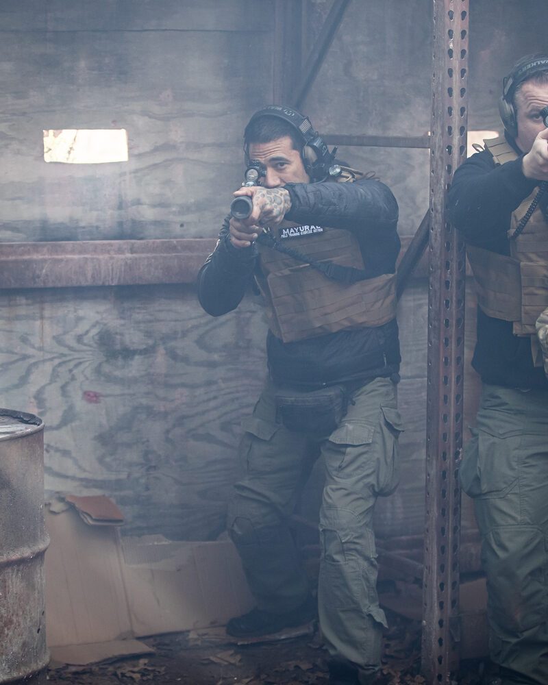 Tactical operators running live-fire drills on the range, tactical training photography by Mind Shift
