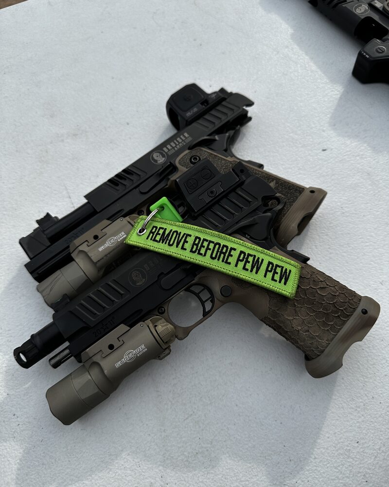 Customized duty pistols detail shot, tactical firearms photography by Mind Shift