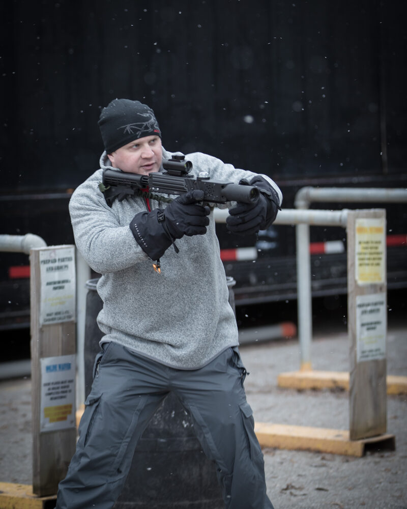 Tactical firearms training in winter snow conditions, military training photography by Mind Shift